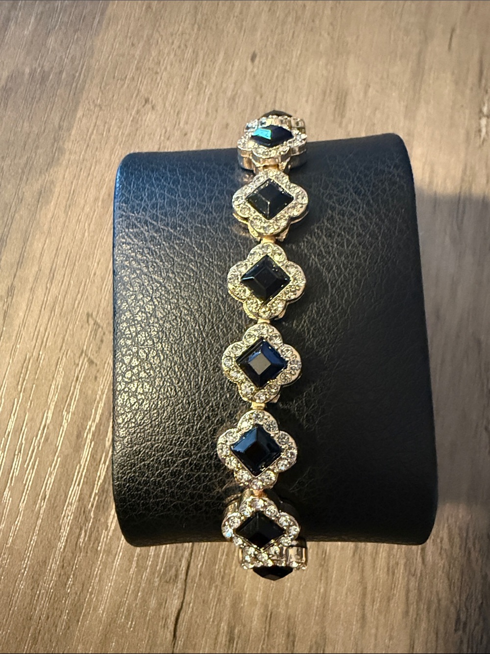 Gold-Tone Clover Bracelet with Black Gemstones and Crystal